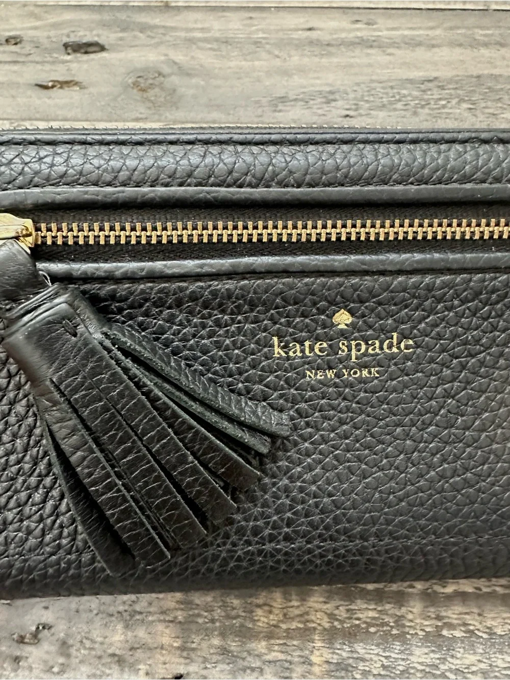 Kate Spade Black Pebbled Leather Tassel Zip Wallet with Gold Hardware